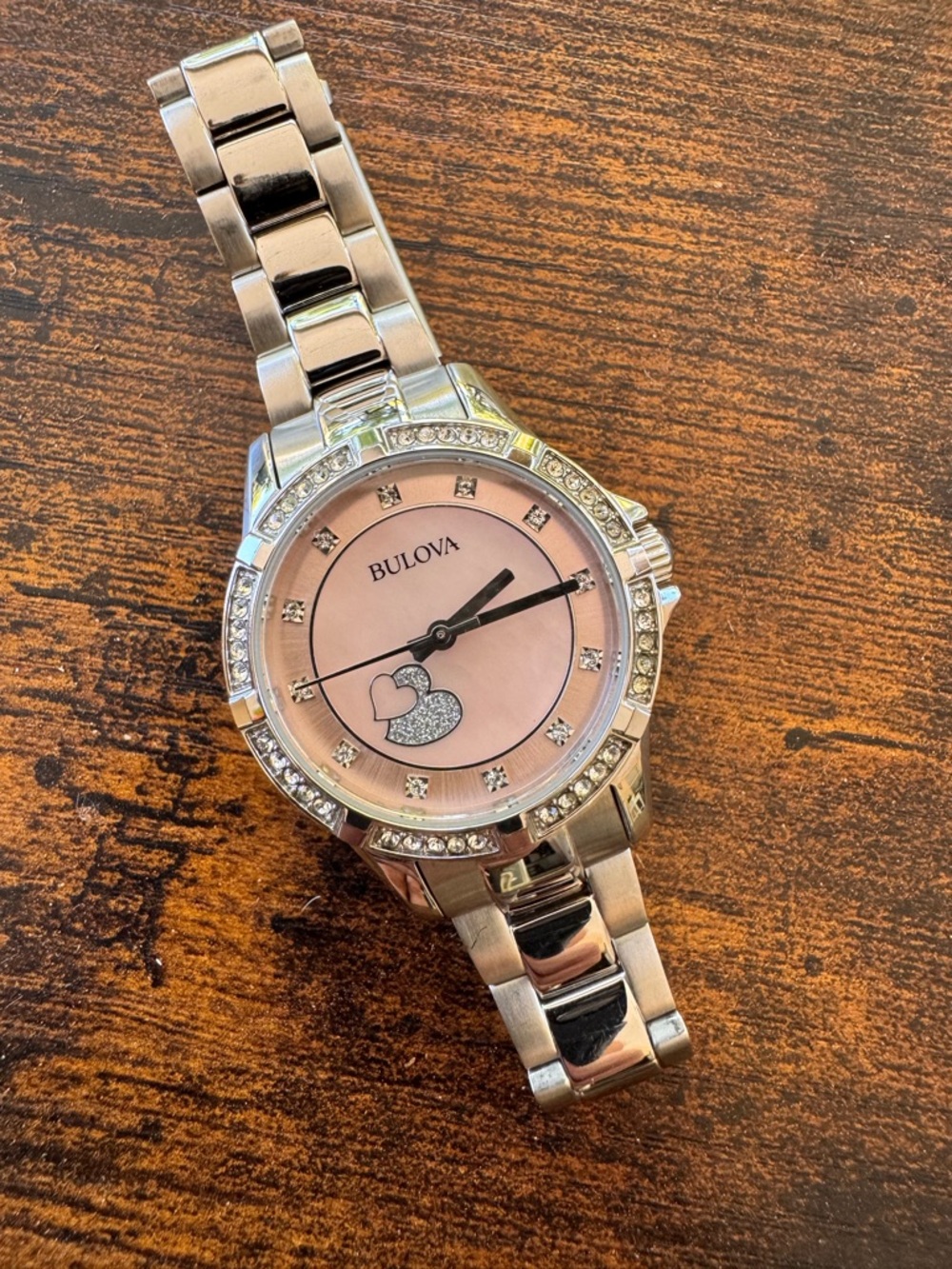Bulova Silver Tone Watch with Pink Dial and Heart Accent